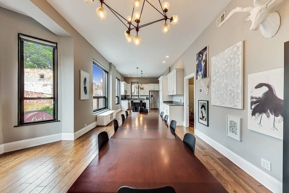 10 person table overlooking large kitchen