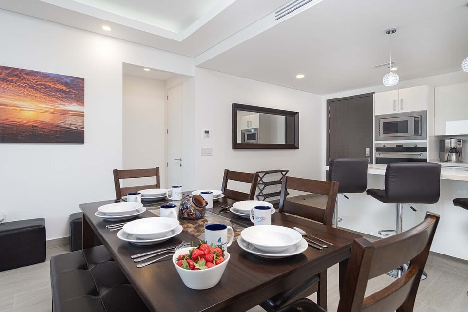 The dining table combines chairs along with a bench.