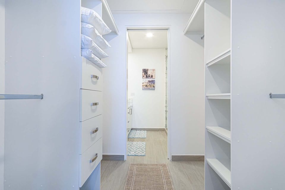 The large walk in closet of the Master Bedroom.