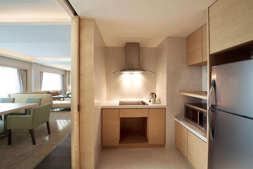 Presidential Suite, 1 King Bed | Private kitchen | Coffee/tea maker, mini-fridge