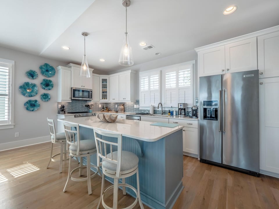 Fully Equipped Kitchen + Breakfast Bar Seating for Three