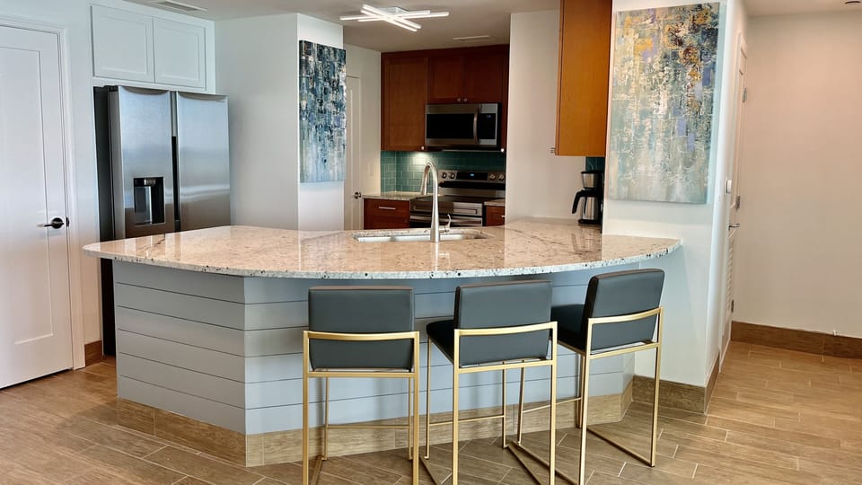 NEW Stainless Steel appliances, River White granite counters and a Snack Bar!