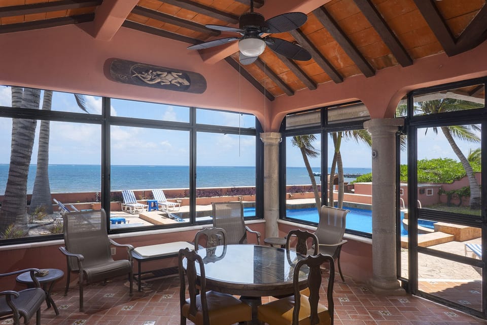 Amazing chill out area - Outside, Inclosed and screened Patio Terrace with pool and sea view - BBQ and extra big fridge available here.