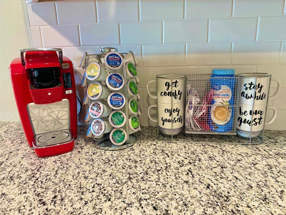 Coffee bar has Keurig and starter set of pods. Regular coffee pot available too
