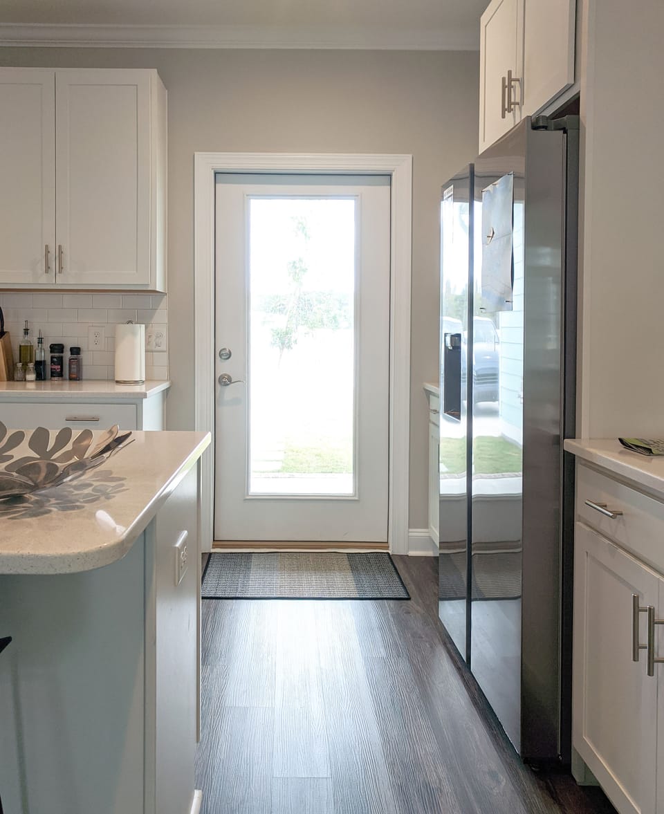 Back door to patio and grill.