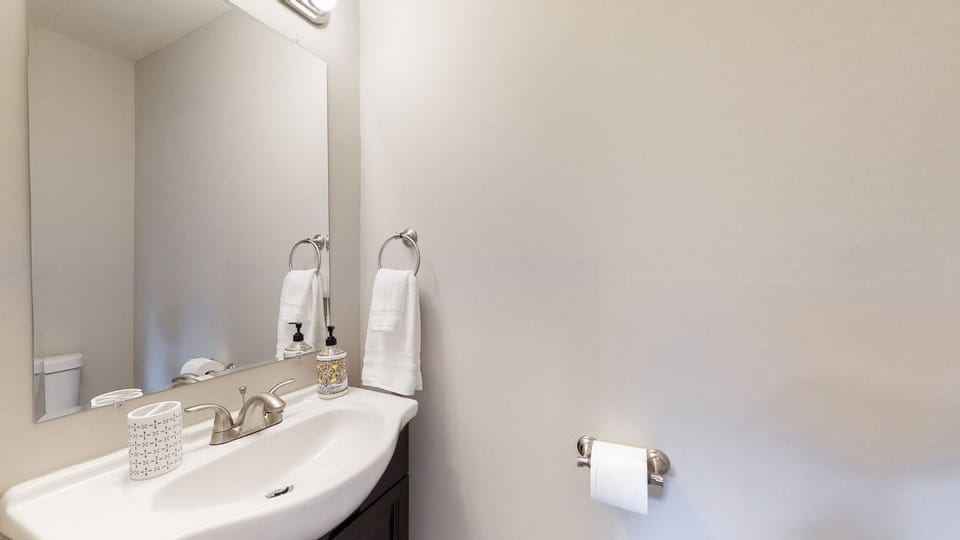 Private 1/2 bath attached to the master bedroom.