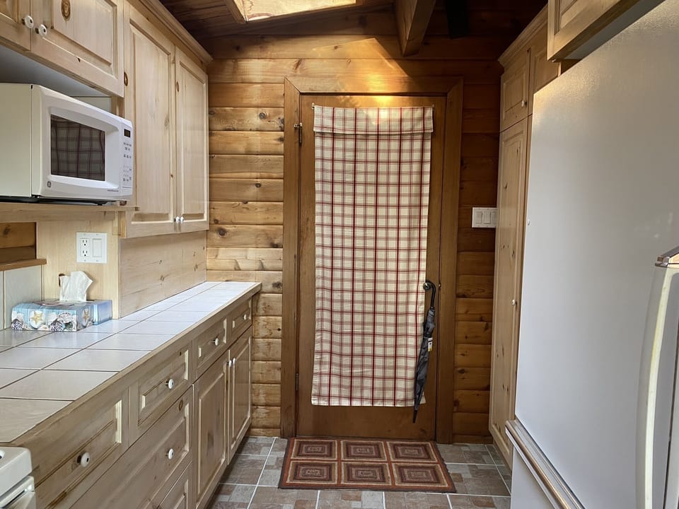 Tons of cupboard space. Sky light in Kitchen