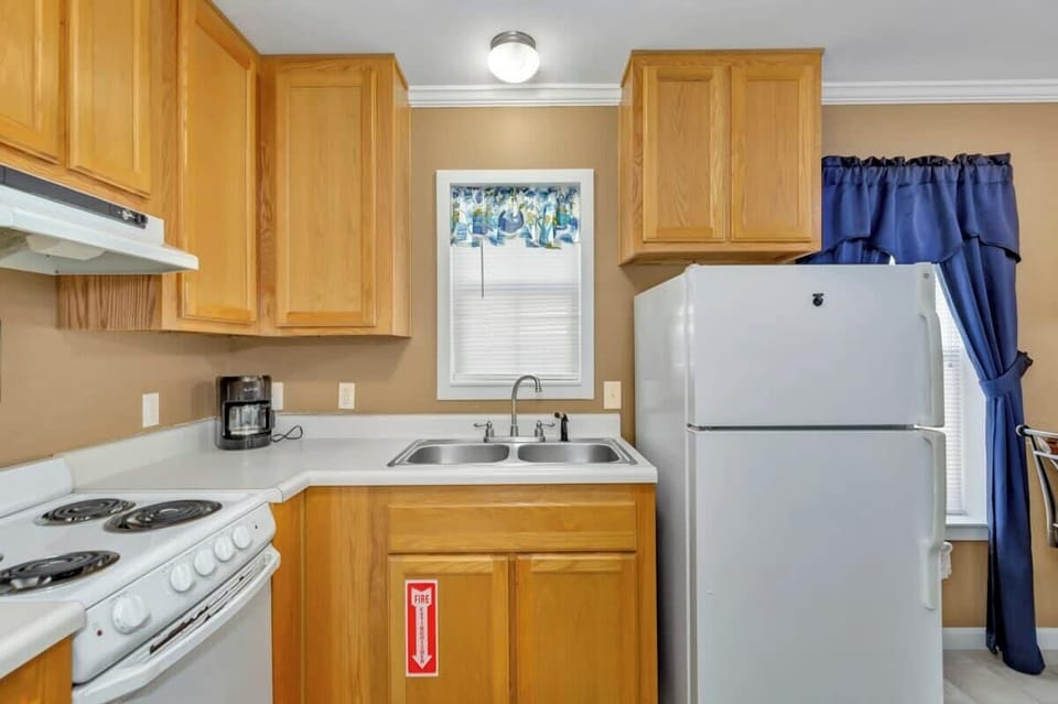 The kitchen comes with most anything you would need to cook and stay home for the evening