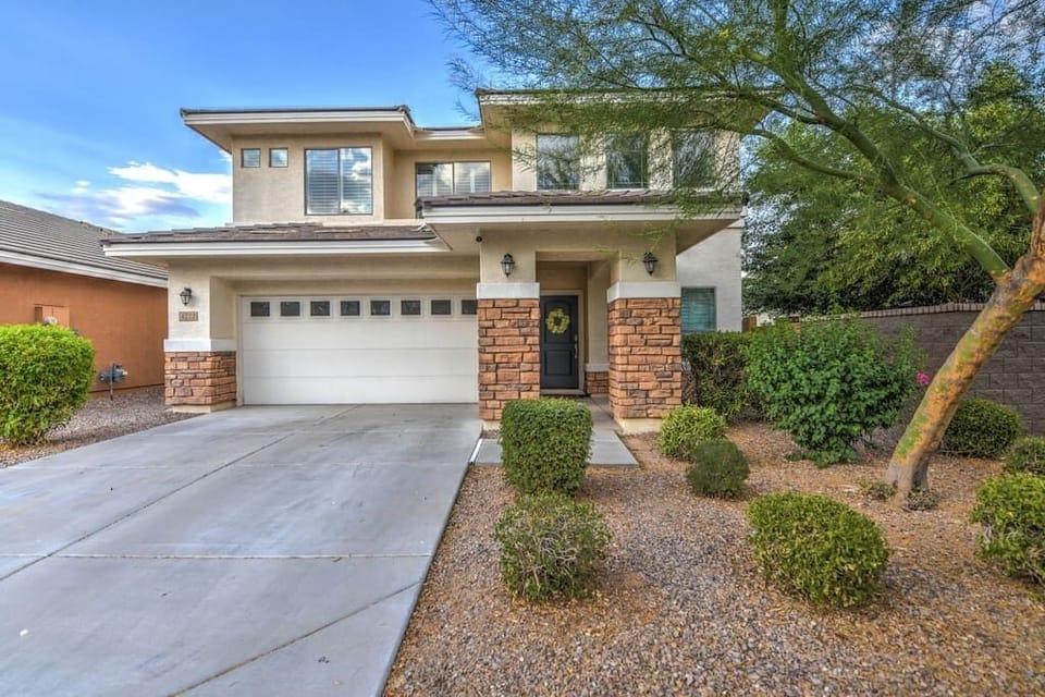 Our modern home is located in the beautiful community of Power Ranch .