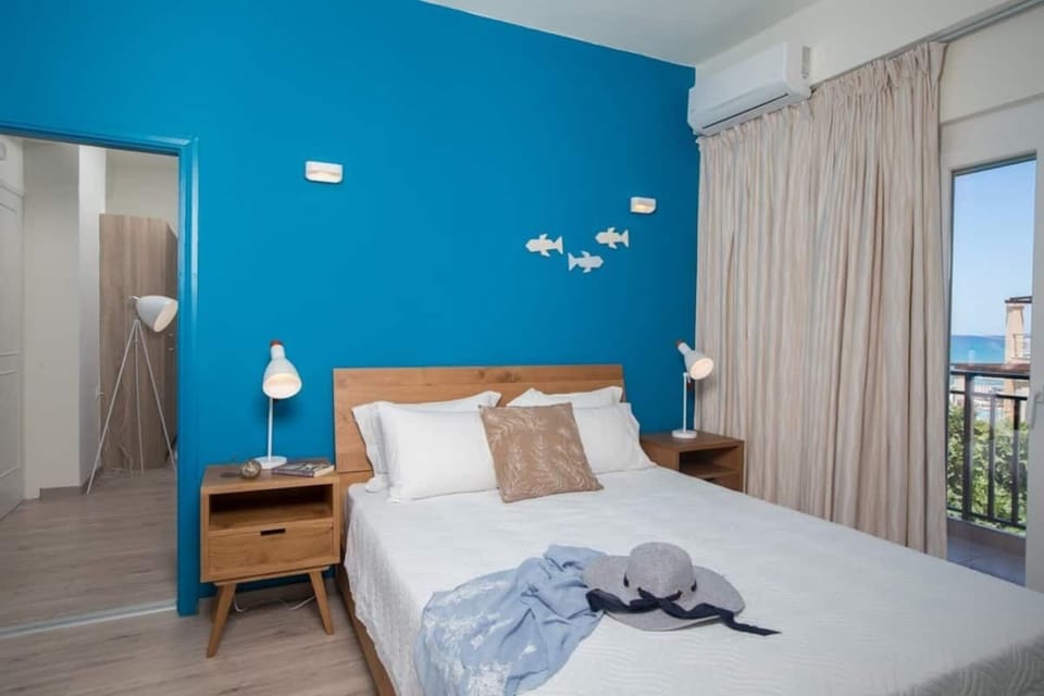 Bedroom with two person bed and air-conditionating