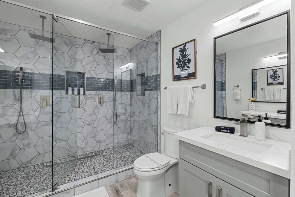 Experience spa-like luxury in the modern bathroom with elegant finishes.