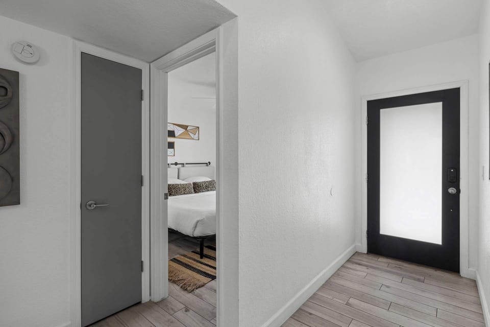 Hallway leading to the other bedroom with king-size bed.