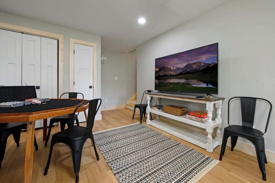 Enjoy game night or movie marathons with a big-screen TV and poker table ready for action