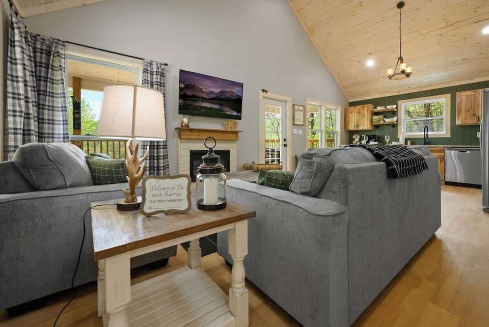 Upstairs is the open living room and kitchen