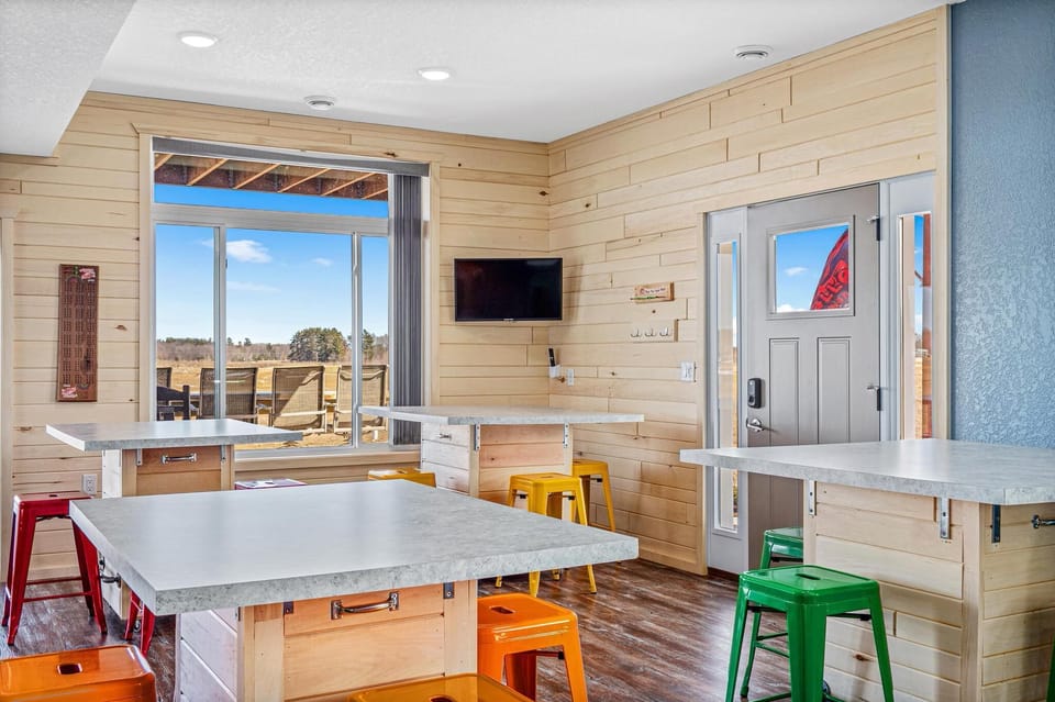 The large windows in the kitchen and living room offer lots of light