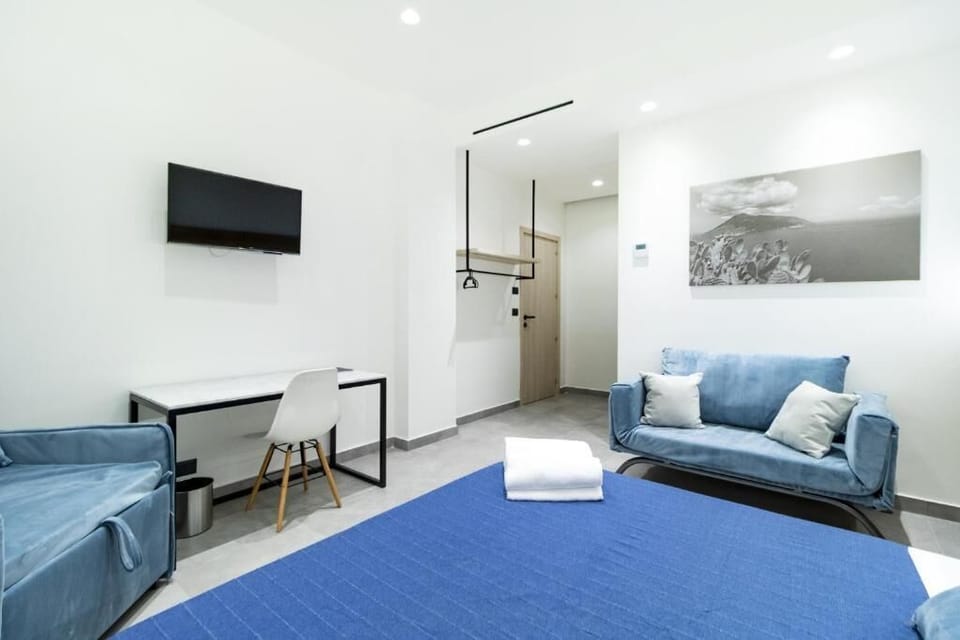Premium bedding, desk, laptop workspace, free WiFi