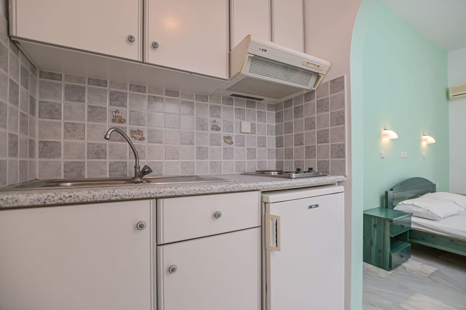 Family Apartment, 2 Bedrooms, 2 Bathrooms, Garden View | In-room safe, iron/ironing board, free WiFi, bed sheets