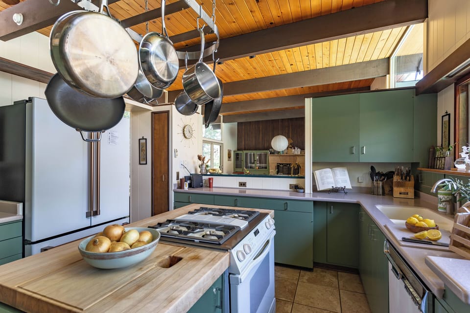 Bright, functional kitchen that flows easily into the dining space. 
