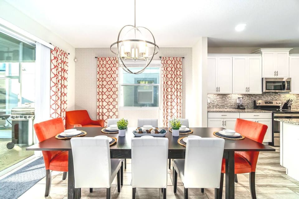 Step right into the sun-filled dining room, adjacent to the private lanai/pool.