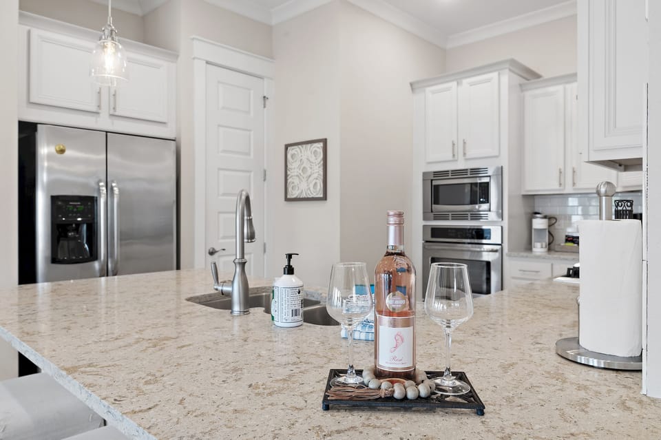 Quartz island—ideal for cocktails, snacks, and meals.