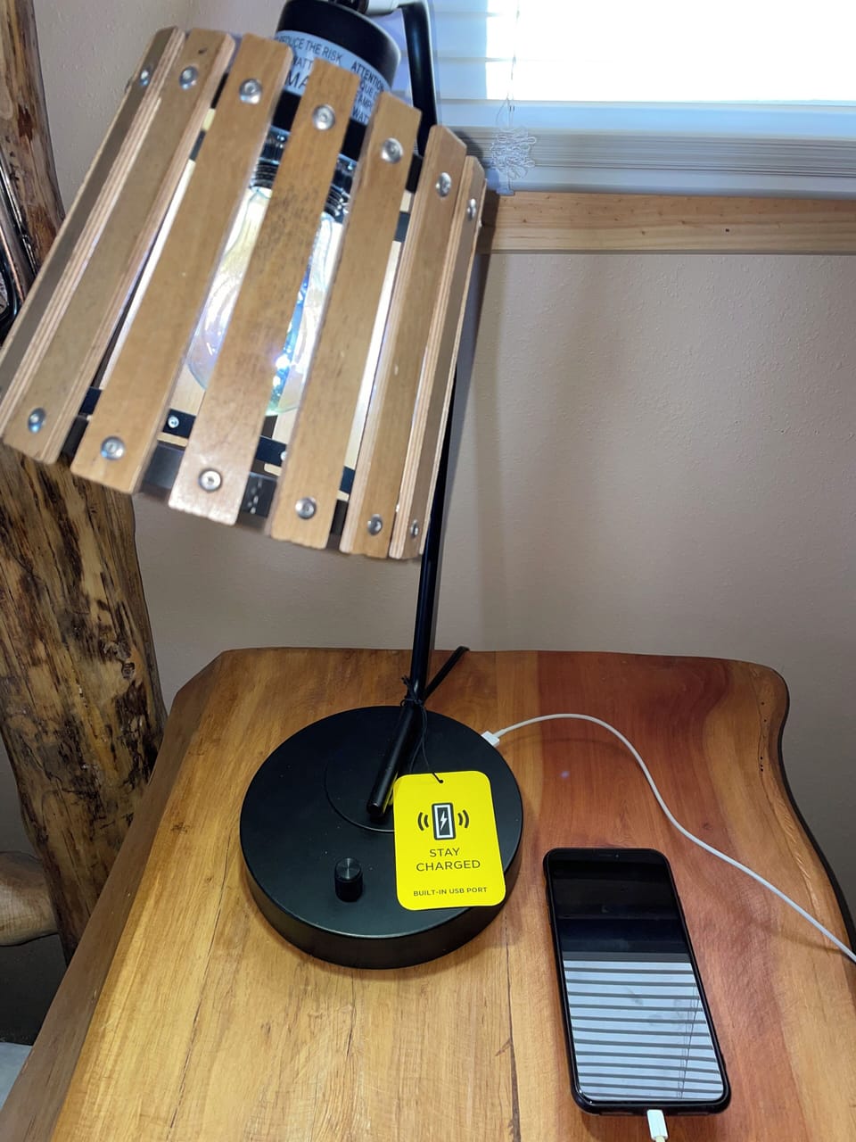 Bedside lamps in the master offer a USB port