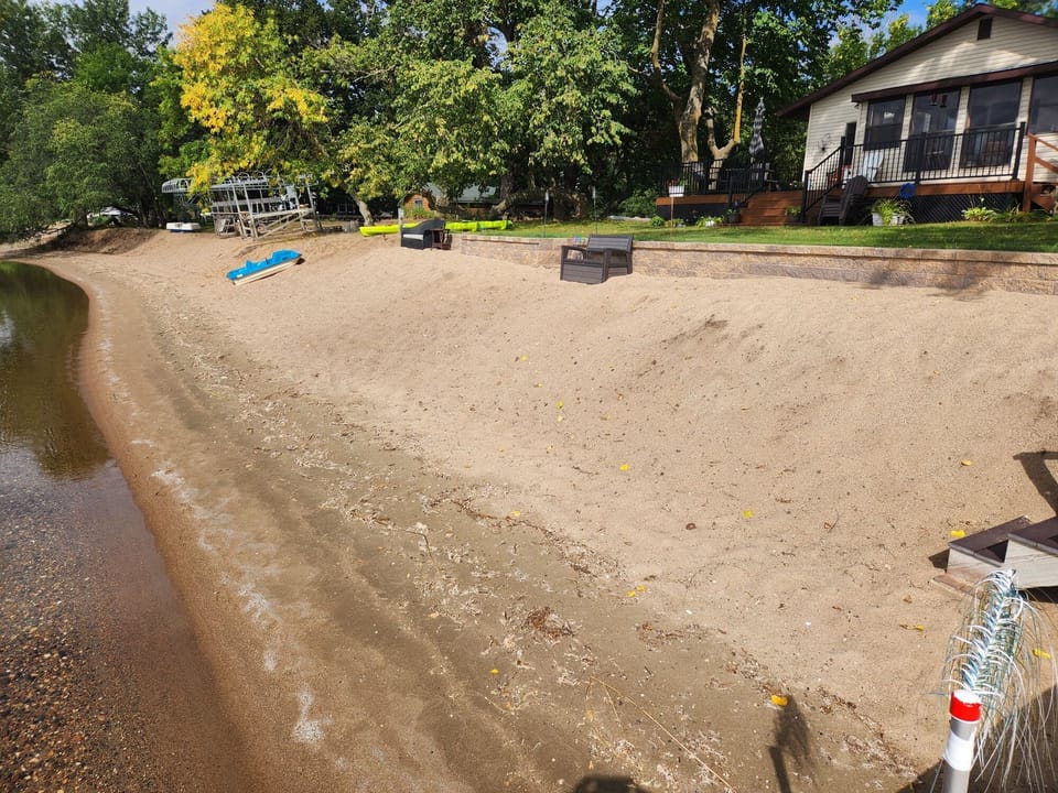100 ft of sandy beach for you to enjoy sand toys provided 
