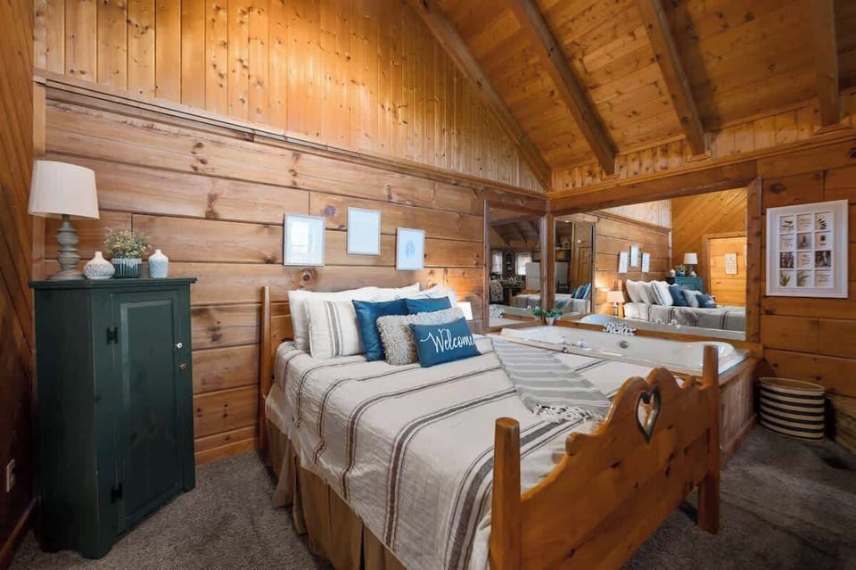 Bed with an indoor jacuzzi on the side