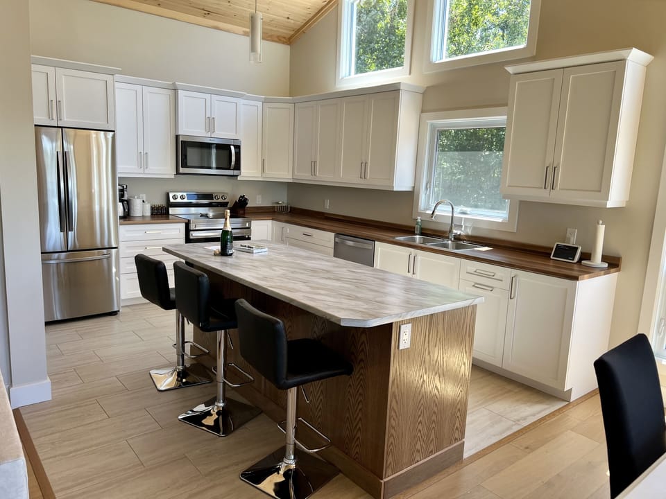 Cook and dine in style in the newly renovated kitchen.
