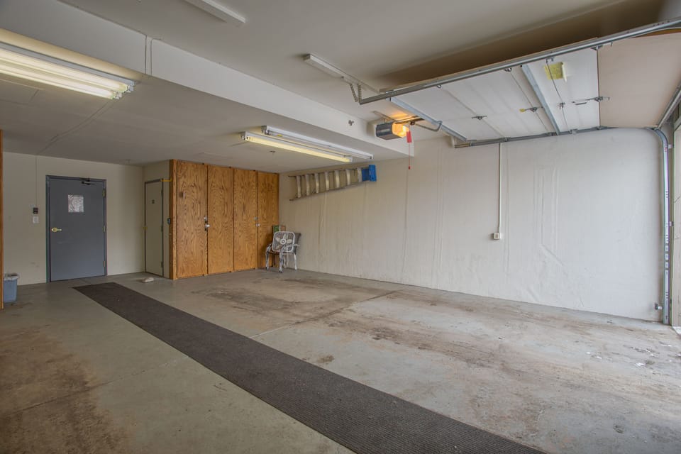 Oversized garage with ski and snowboard storage
