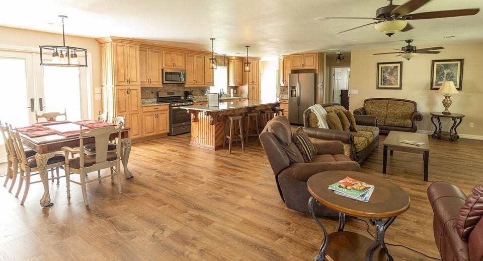 Pine Ridge - Spacious open living room with kitchen and dining area 
