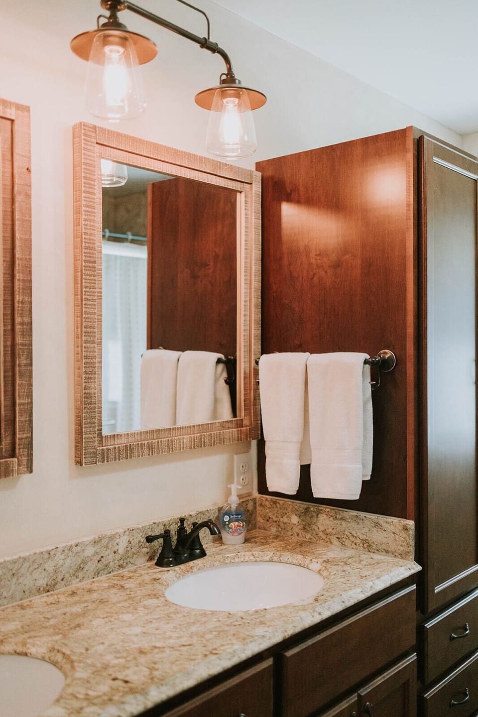 Primary bathroom with tub and stand-up shower