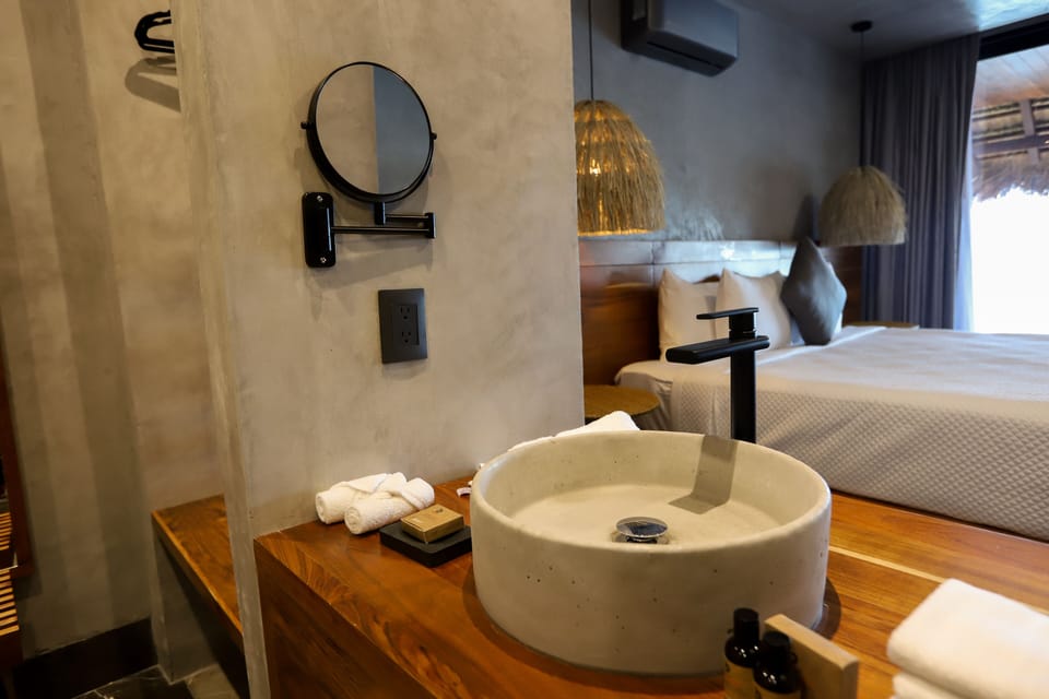 Separate tub and shower, rainfall showerhead, free toiletries