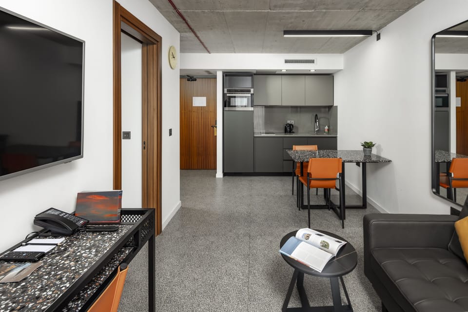 Executive Suite, 1 Bedroom, City View | Premium bedding, in-room safe, desk, laptop workspace