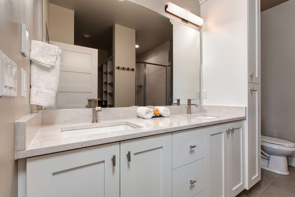 Master Bath 2 with Two Sinks and a Shower