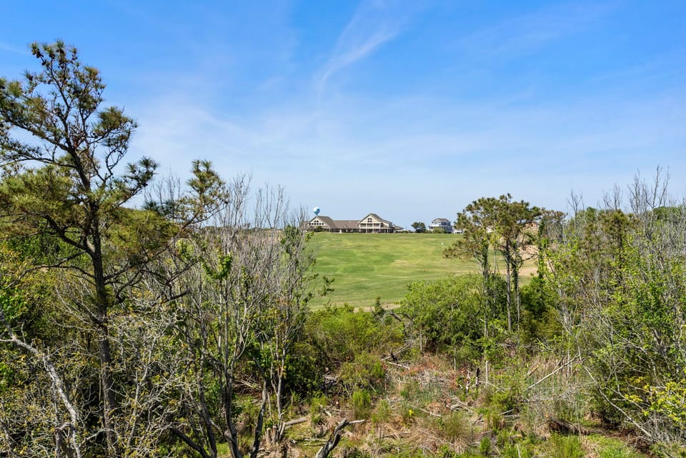 CC138: All Inn and Then Some | Top Level Back Deck Golf Course View