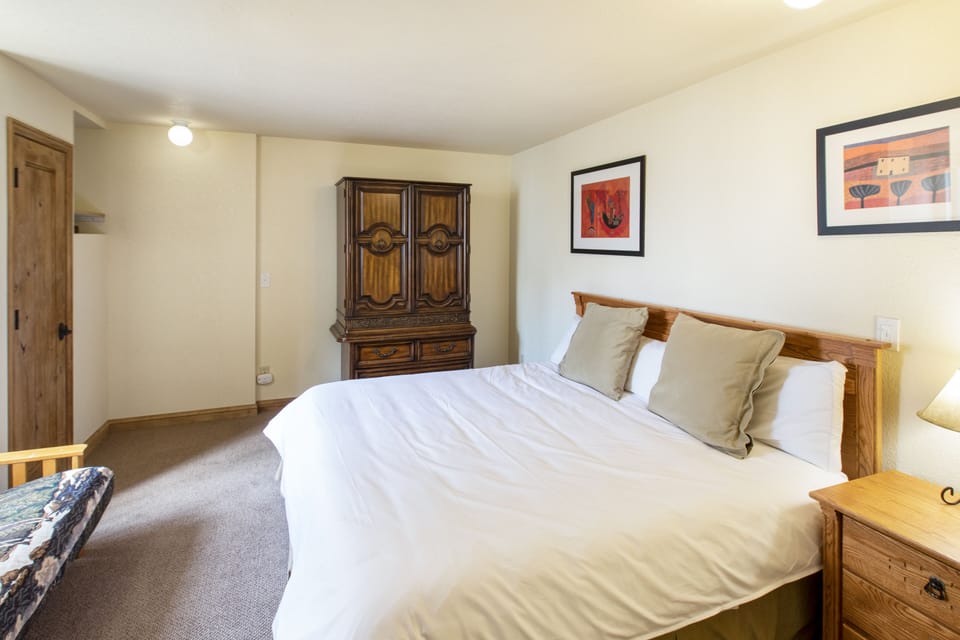 Primary bedroom features a king bed.