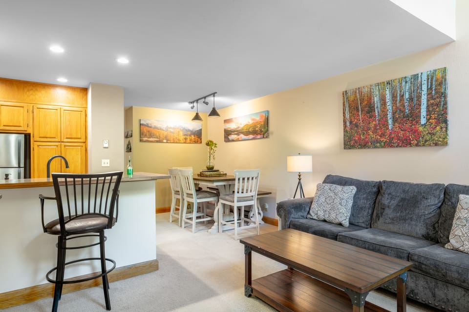 Dining area is behind the living room.
