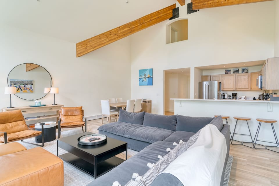 Living room features a large sectional sofa.
