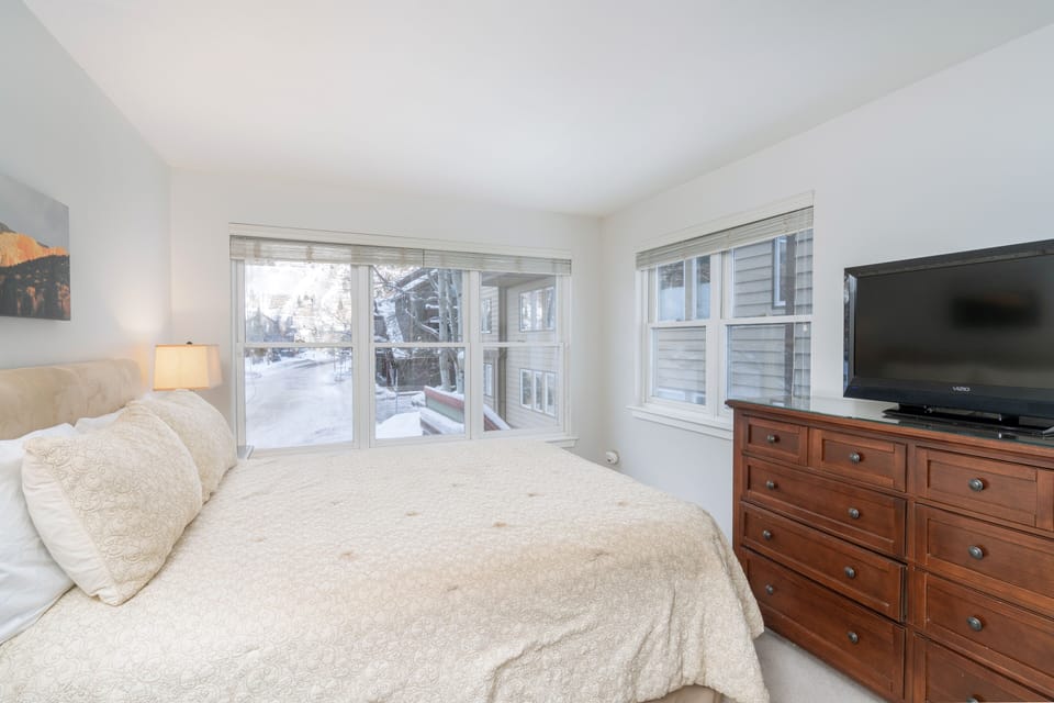 Primary bedroom features a queen bed..