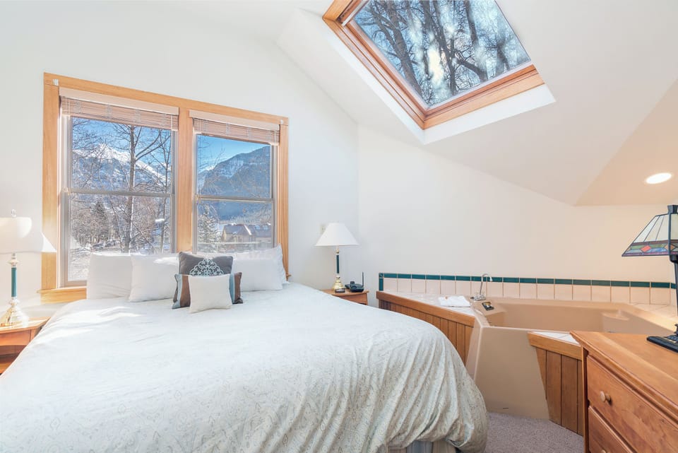Primary bedroom features a king bed.
