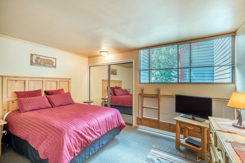 Primary bedroom features a queen bed.