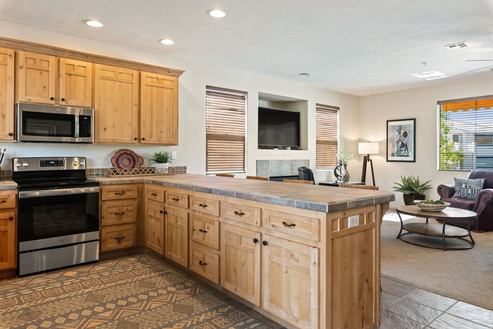 Condo, 2 Bedrooms | Private kitchen | Fridge, microwave, oven, stovetop