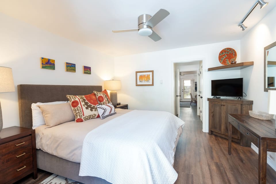 Primary bedroom features a king bed.