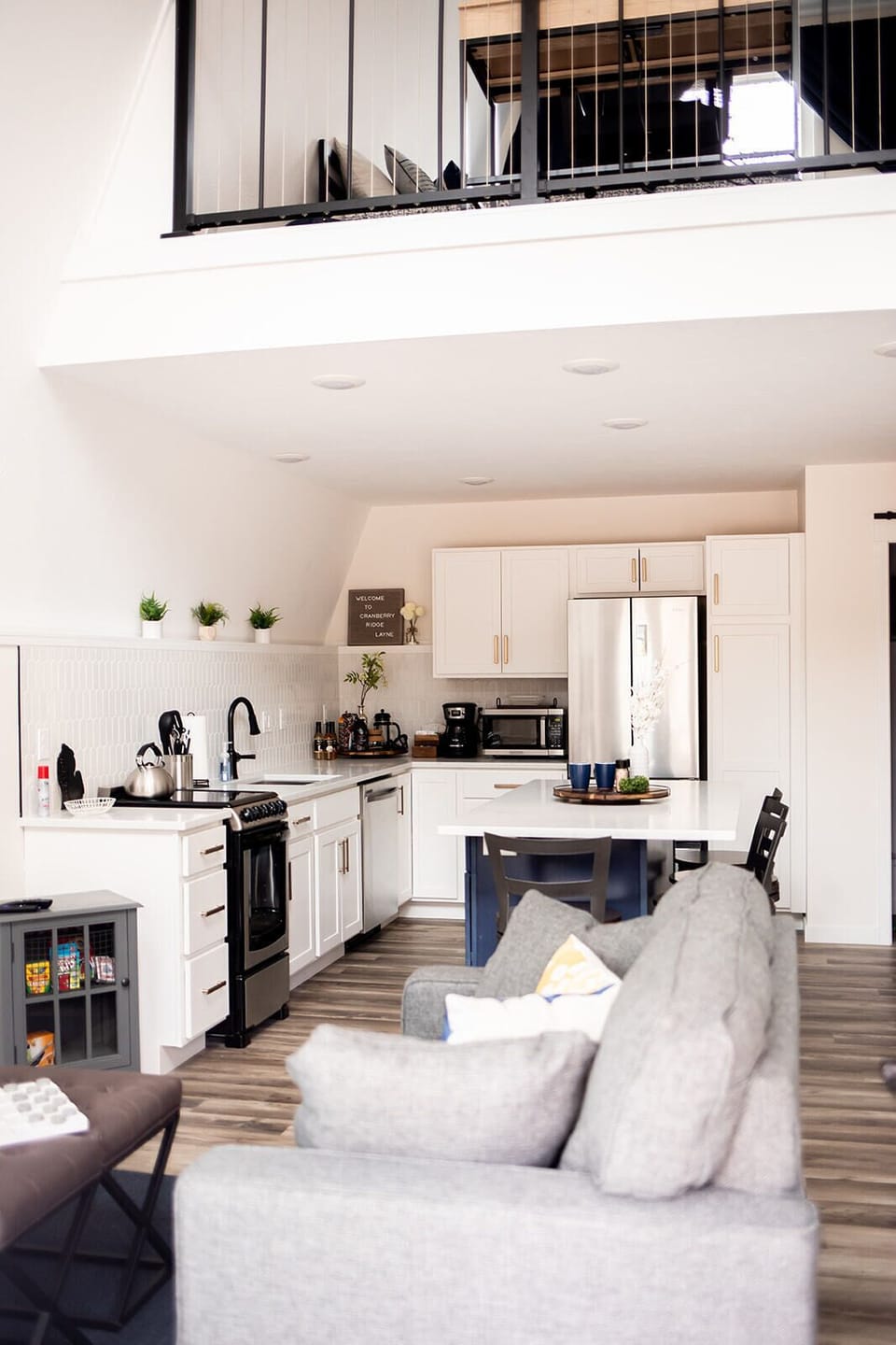 View from the front door. Open concept kitchen and living area