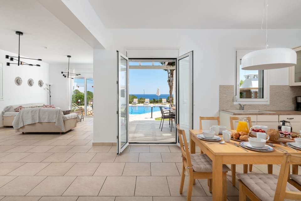 Open plan kitchen and lounge leading to the pool area