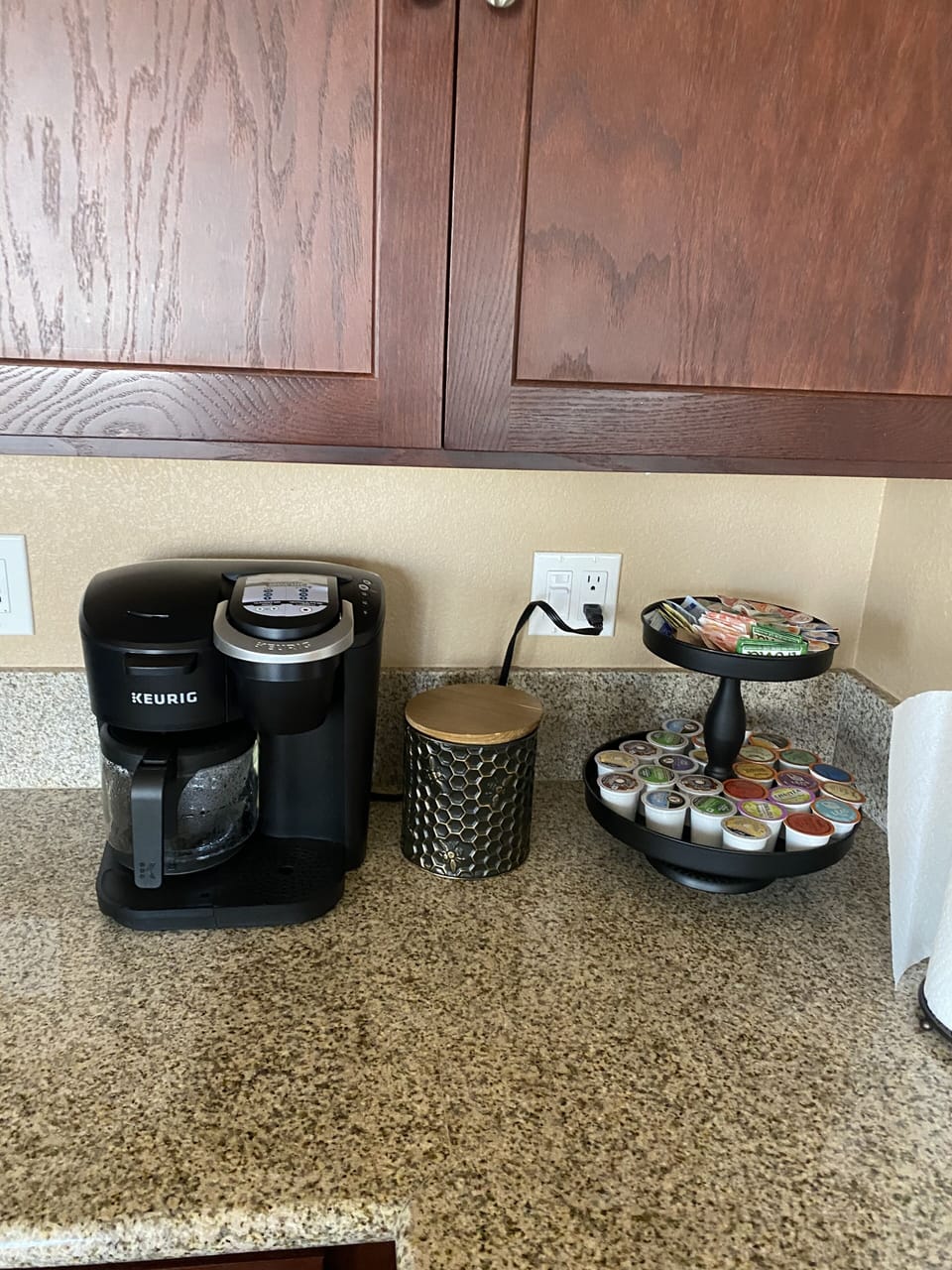 Coffee Maker with coffee, creamers and sugars and tea.  Keurig and regular pot