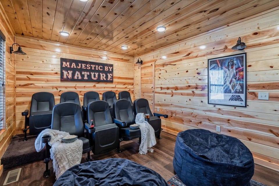 Watch your favorite movie in the theater room with popcorn and drink holders!
