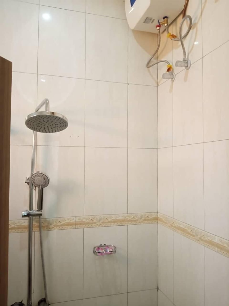 Shower, rainfall showerhead, towels, soap