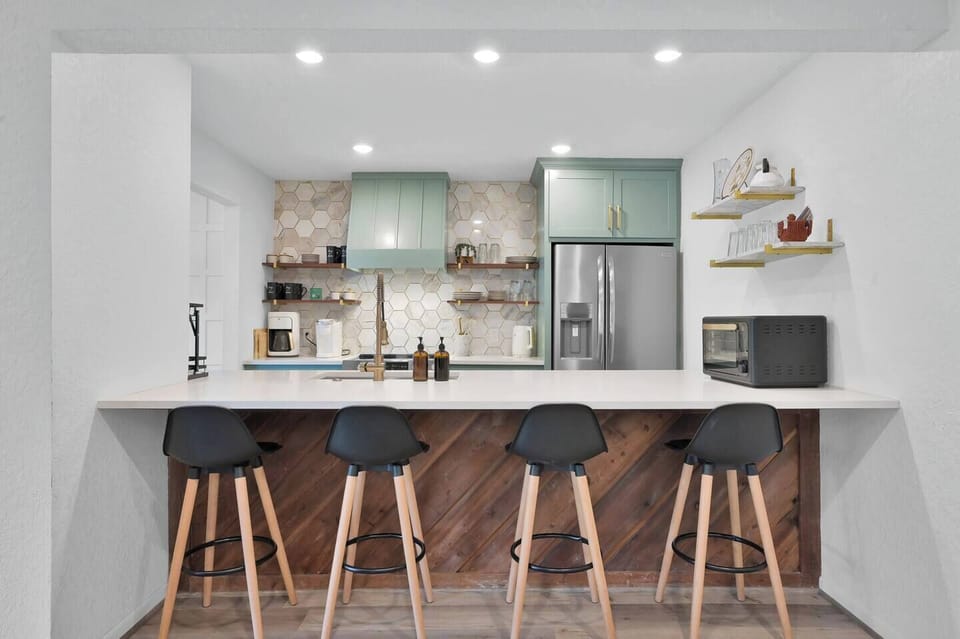 Fully equipped kitchen for cooking and festivities.  Eat in bar, toaster oven, blender and crock pot for all your cooking needs.