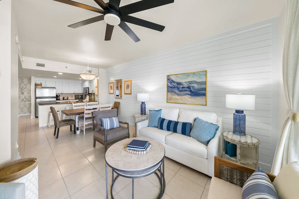 Relax in your bright, coastal-inspired living space with comfortable seating, a fully equipped kitchen, and nautical blues throughout.